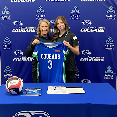 Head Coach Becky Grisdale & new recruit Liz Gavey pose for photos after signing her OCAA Letter of Intent