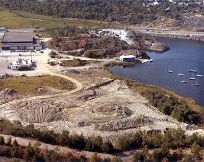 Aerial view of site of Science North (near beginning of construction) at Bell Grove along the west end of Lake Ramsey (Sept. 29, 1981)