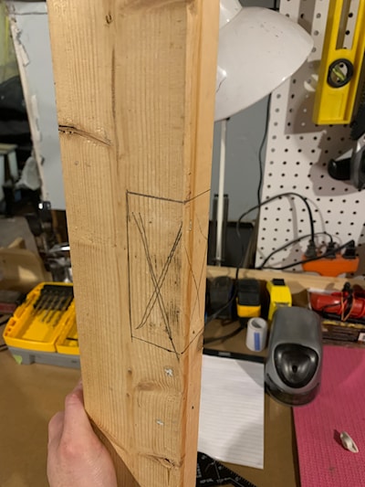 2x4 with a notch area marked to be cut out.