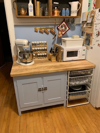 Overview of the cabinet with a brand new maple top