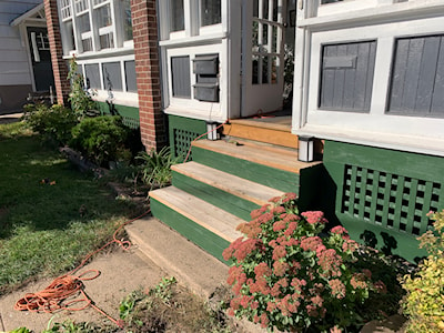 The panels along the front of the house