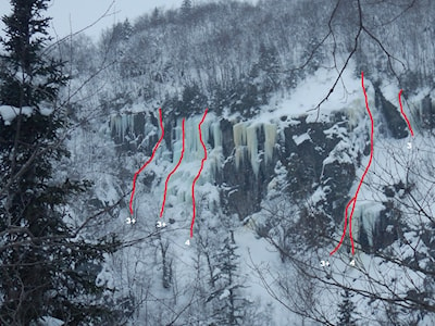             The red lines mark the route and the numbers represent the climbing grade                   