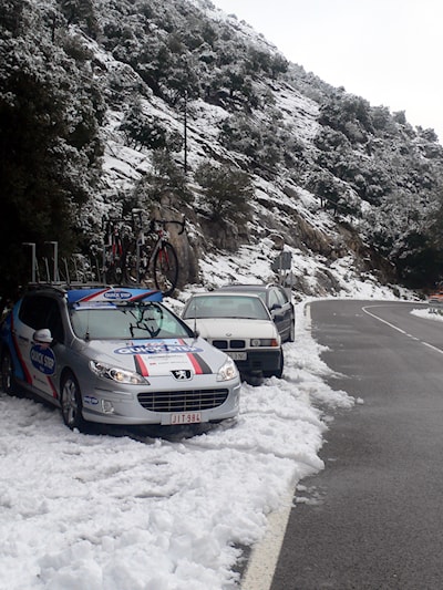 Team cars in the snow