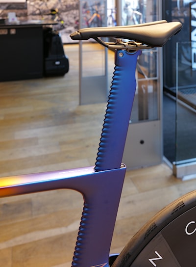 The undulating front surface and truncated aft shape of the seat tube and seat post.