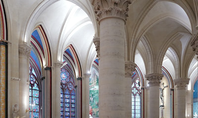 A forest of columns, supporting the corniced arches.