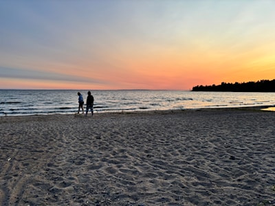 Walk along the beach at sunset 